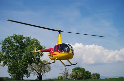 helicopter flies the sky