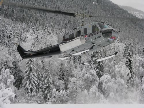 helicopter snow mountain