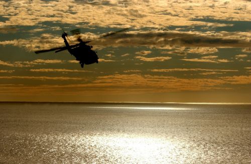 helicopter aircraft sunset
