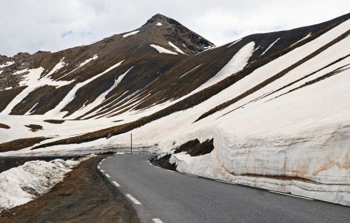 high alps pass road snow reste