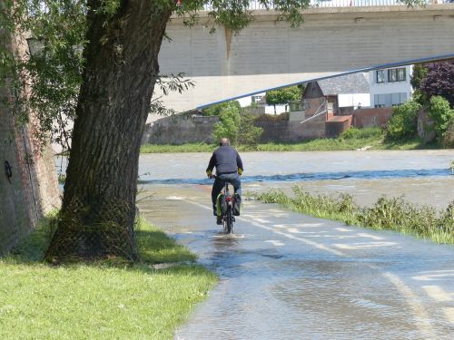 high water cyclists wet