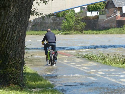 high water cyclists wet