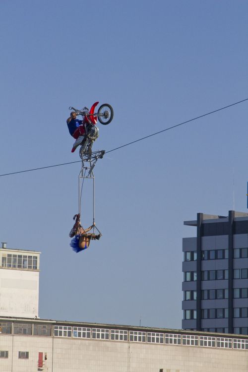 high-wire artist motorcycle rope