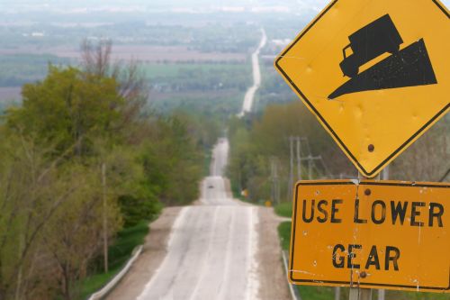 hill road warning sign