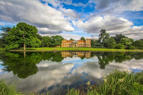 historic building lake reflection