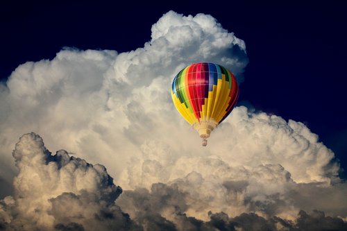 hot air balloon  clouds  flying