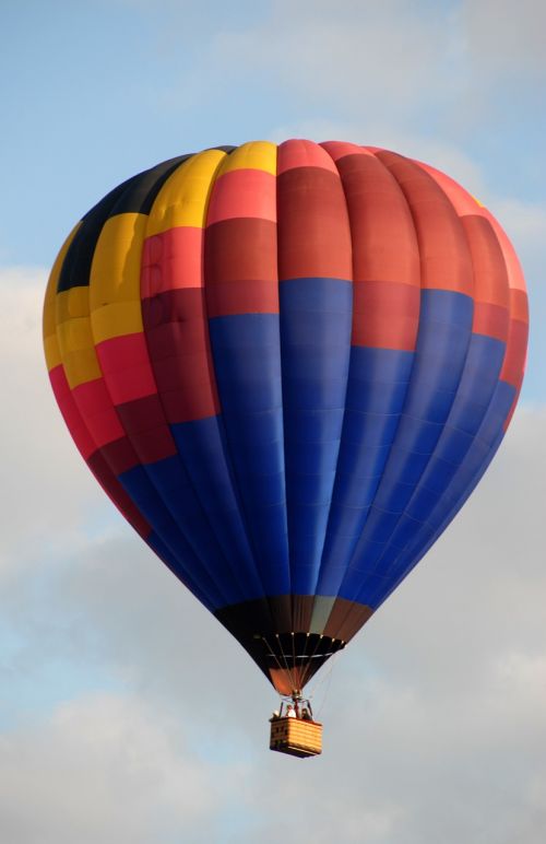 hot air balloon rainbow sky