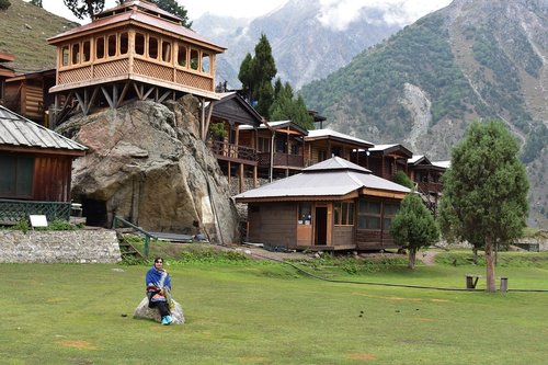 hotel  mountains  grass