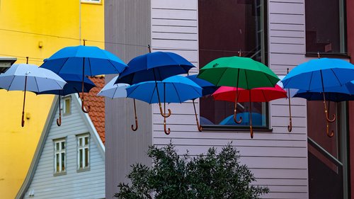 house  umbrellas  colorful