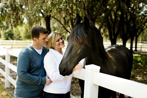 hug couple horse