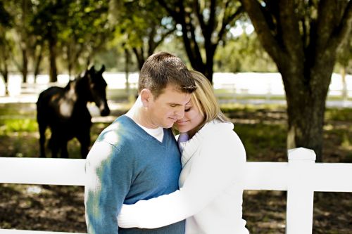 hug couple horse