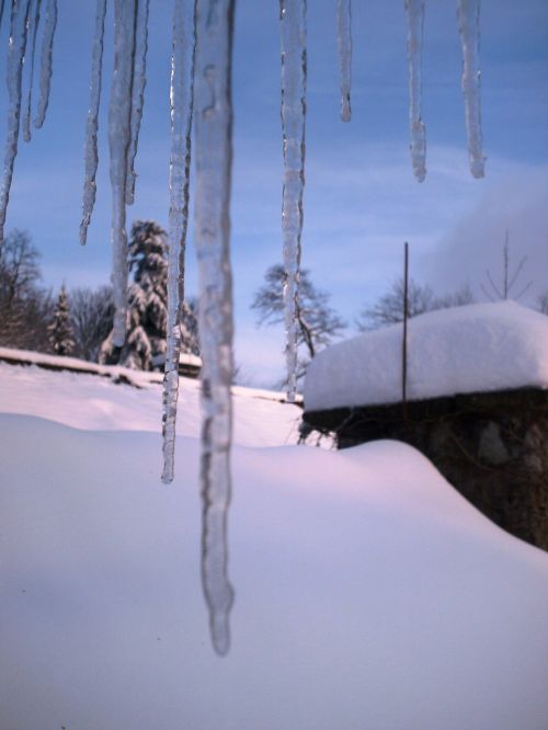 icicle snowshed blue sky