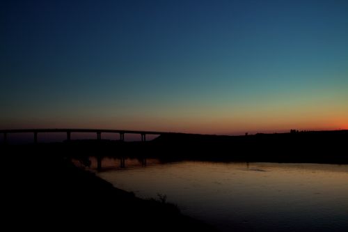 in the evening bridge water