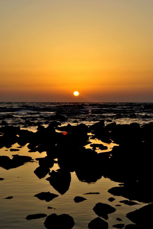 india sunset shore