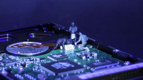 information technology  data thieves  miniature figures