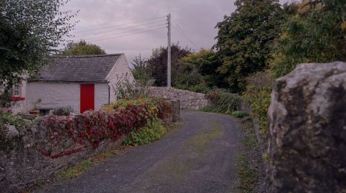 ireland gravel road stone wall