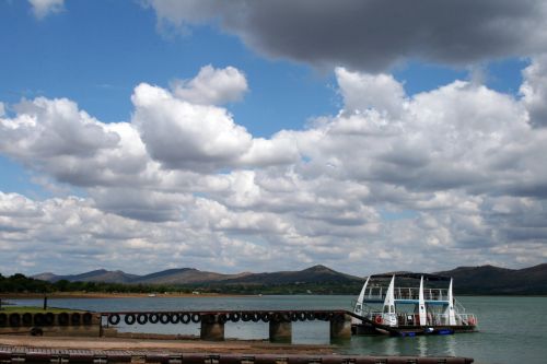 Jetty And Cruise Vessel With Clouds