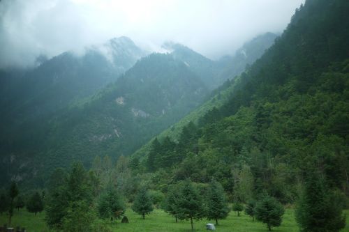 jiuzhaigou mountain distant hills