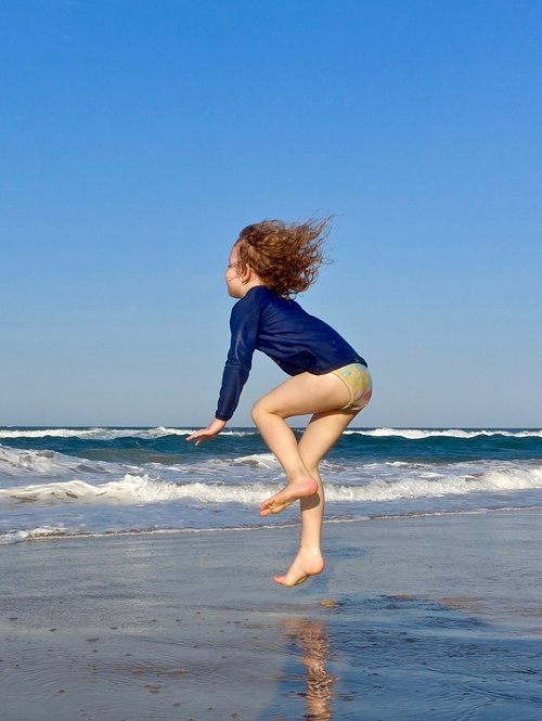 jump  child  beach