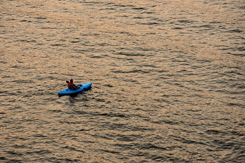 kayak  sunset  water