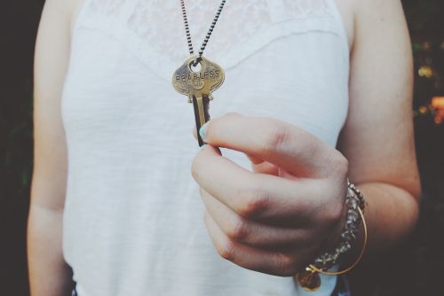 key holding hand