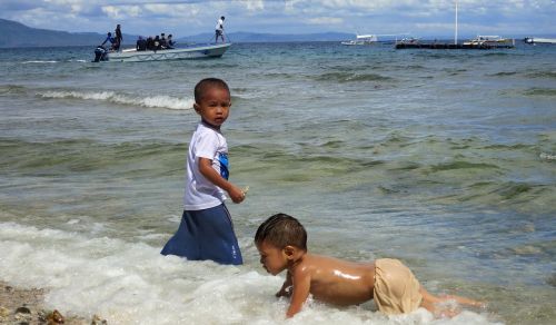 kids playing beach