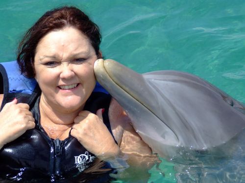 kiss dolphin water