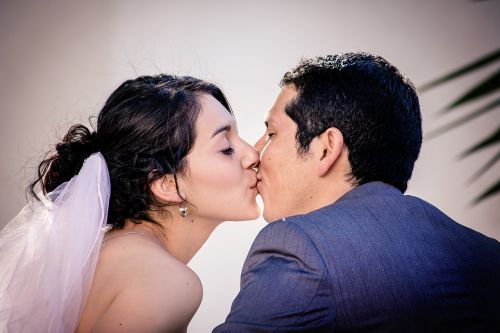 kissing wedding couple bride