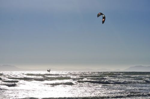 kite surfer sea sun light