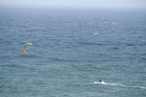 Kite Surfer With Bright Sail