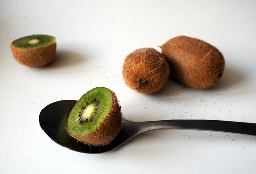 kiwi  kiwis  spoon