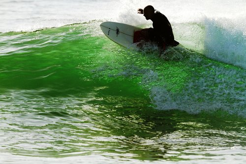 knee boarding  waves  morning