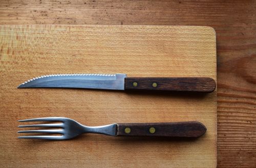 knife and fork cutting board wooden