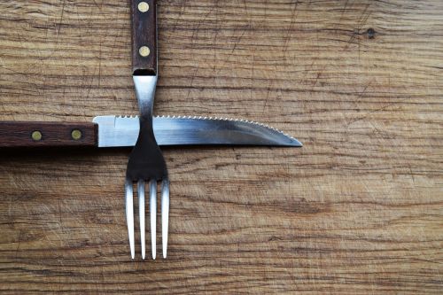 knife and fork menu design cutting board