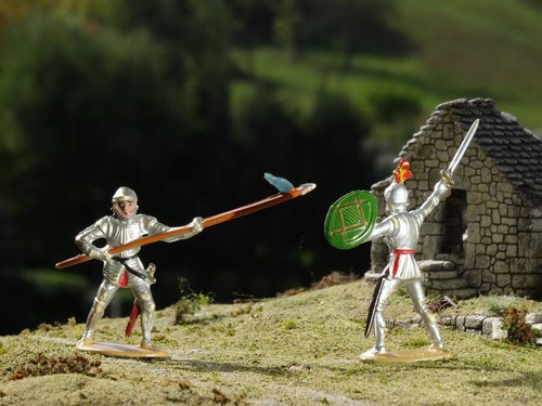 knight  figures  duel