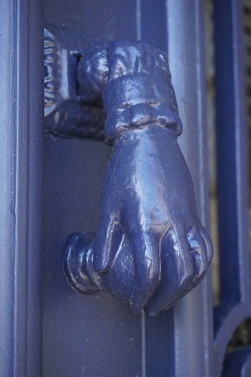 knocker handle hand