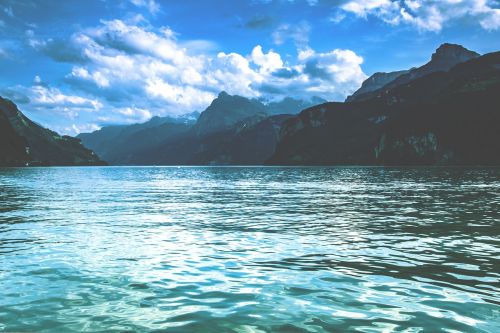 lake mountains switzerland