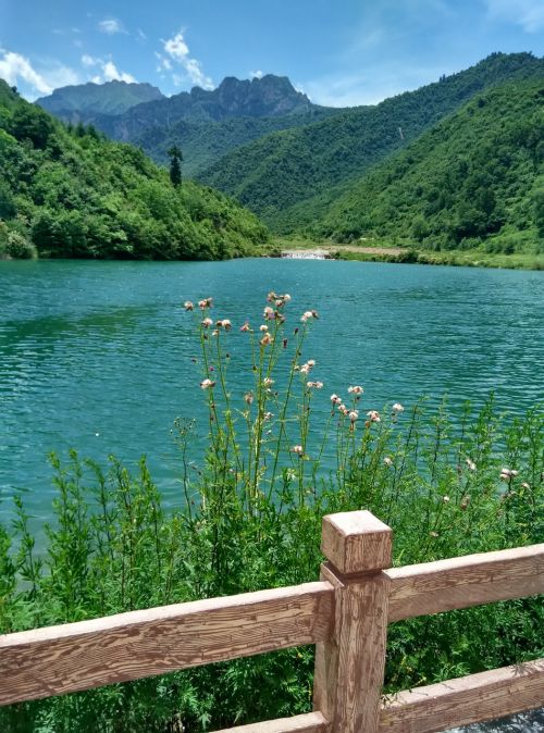 lake mountain blue sky