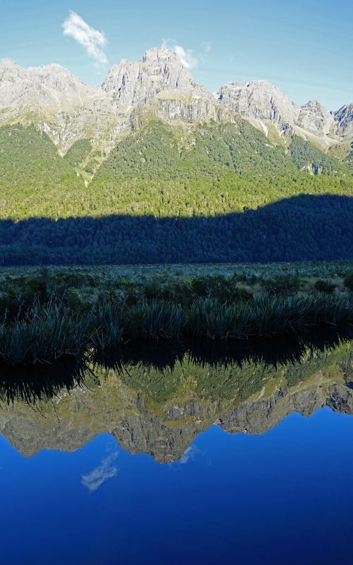 lake mirroring mountains
