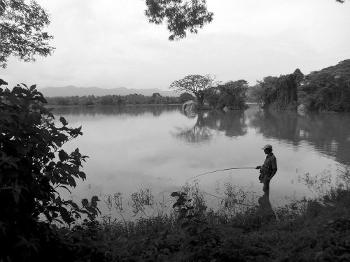 lake fisherman black and white