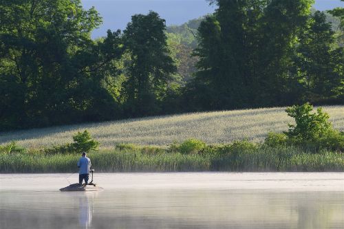 lake fisherman morning mist