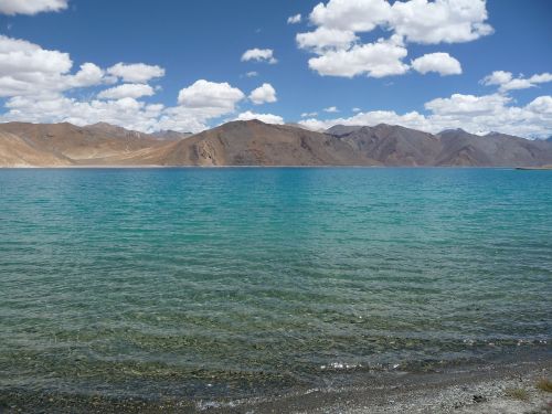 lake mountains clouds