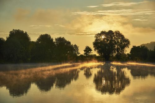 lake haze sun