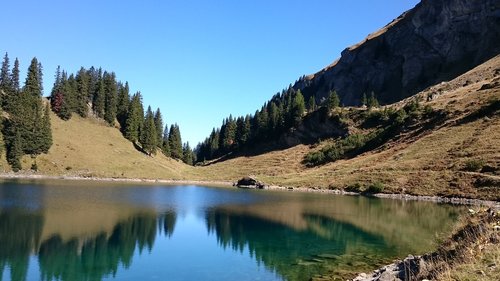 lake lioson  mountain  reflections