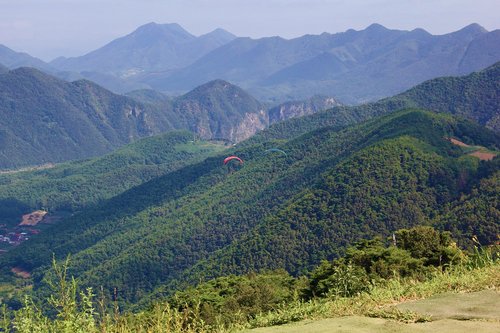 landscape  mountains  paragliding