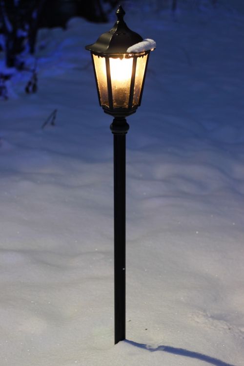 lantern in the snow snow
