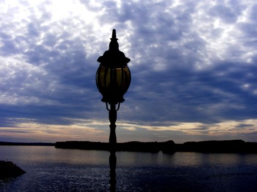 lantern in the evening water