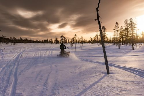 lapland polar winter snowmobile