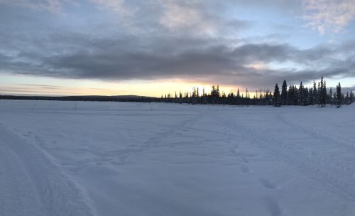 lapland the frozen lake sunset