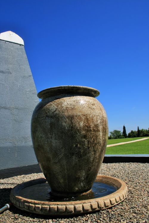 Large Pot And Wall In Garden